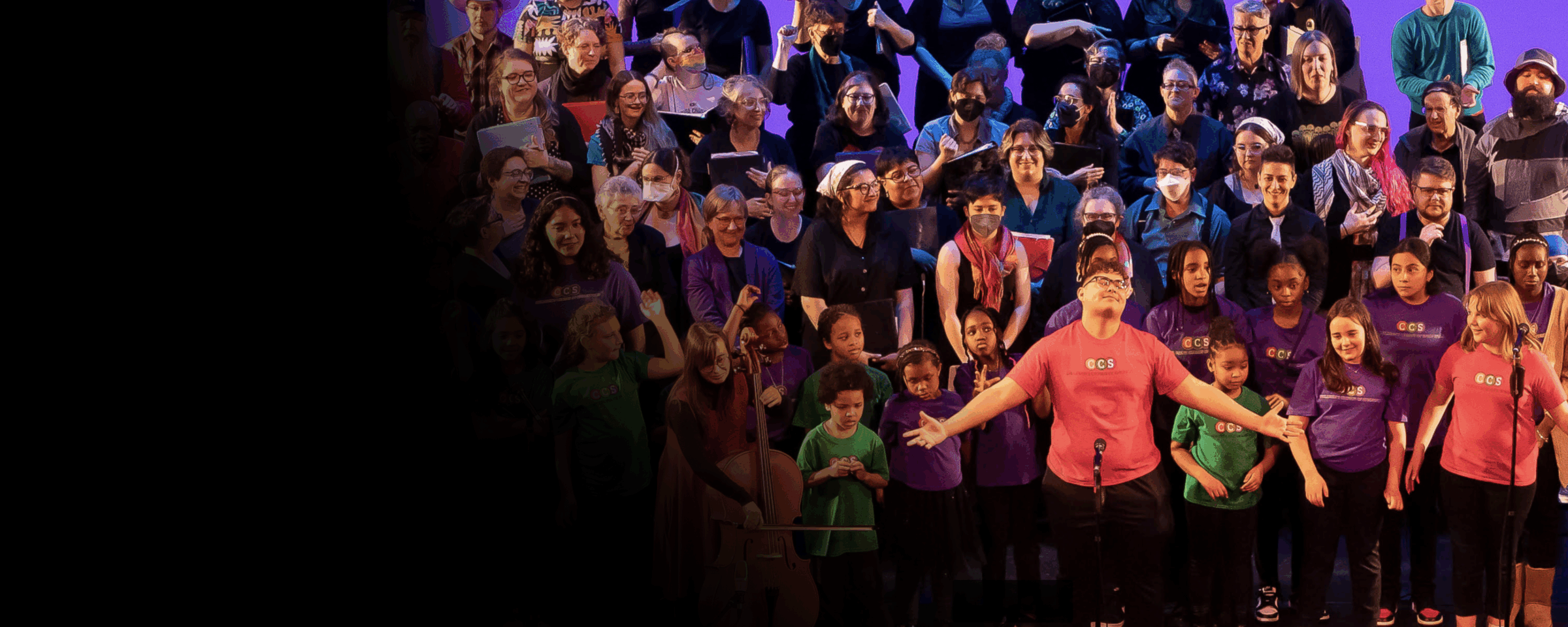 Young students singing in colorful t-shirts