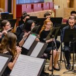 One side of YWES playing in the winter concert