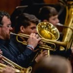 Close up of trumpet player in YWES playing in the winter concert