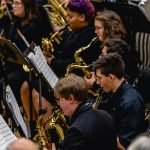 The saxophone section of YWES playing in their winter concert