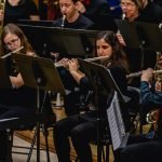 The flute section and clarinet section playing in the YWES winter concert