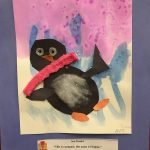 Prelude preschool art piece, penguin made with construction paper with watercolors in the background and a blue paper border